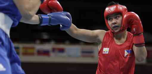Olympics-Boxing-Filipina Petecio advances to finals; old rivals to meet in semis