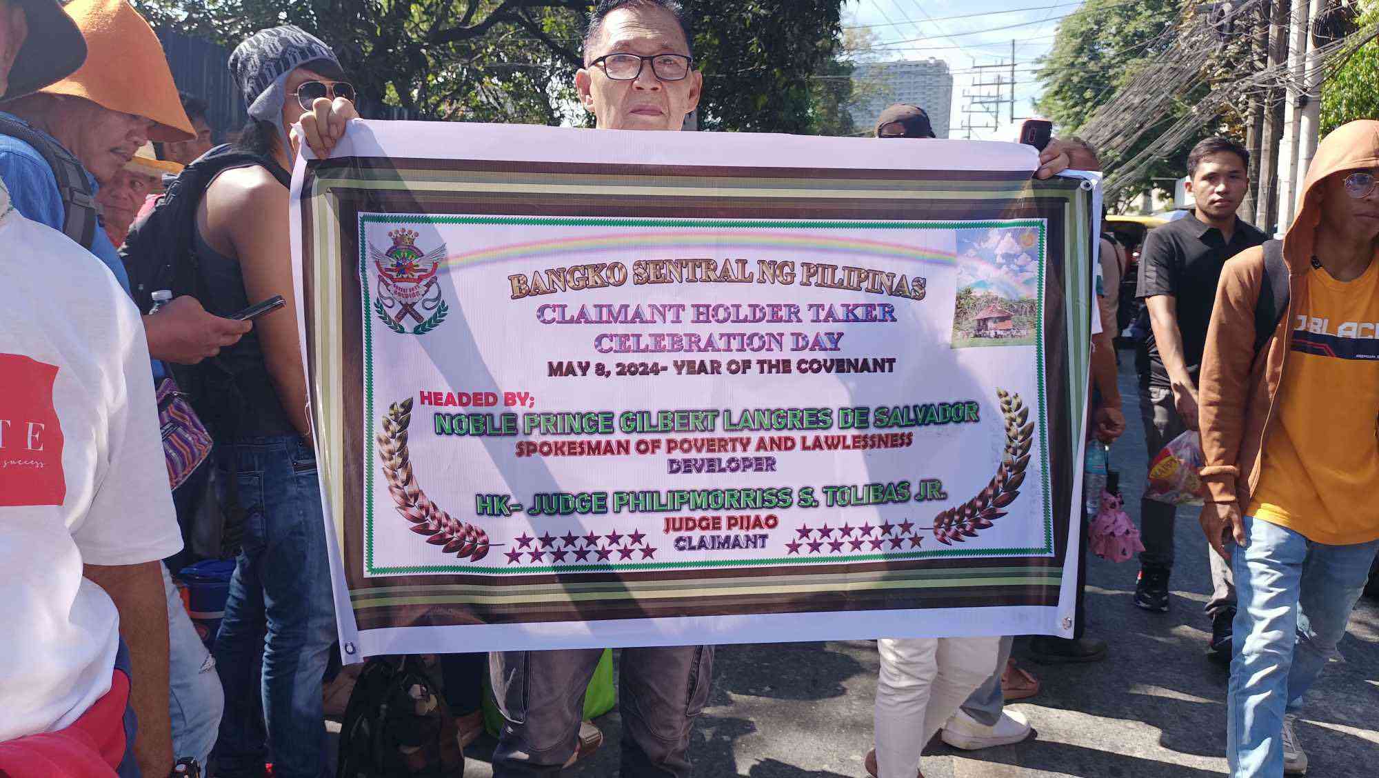 LOOK: Group strikes at BSP to claim alleged 'hidden treasure' reserved for Filipinos