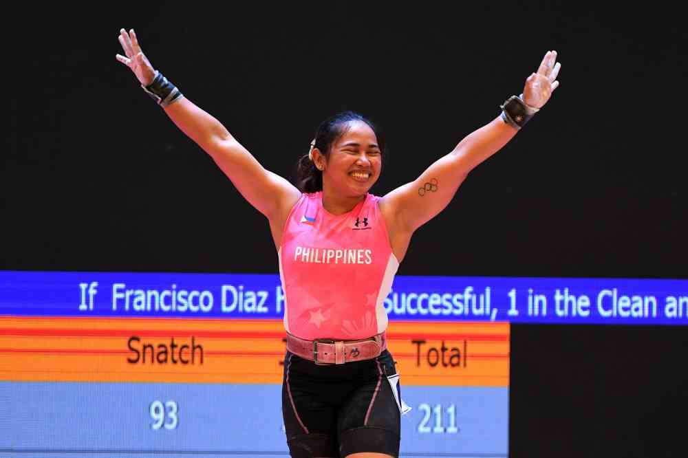 'World Champion' Hidilyn Diaz makes complete sweep as she clinches 3 elusive golds in weightlifting