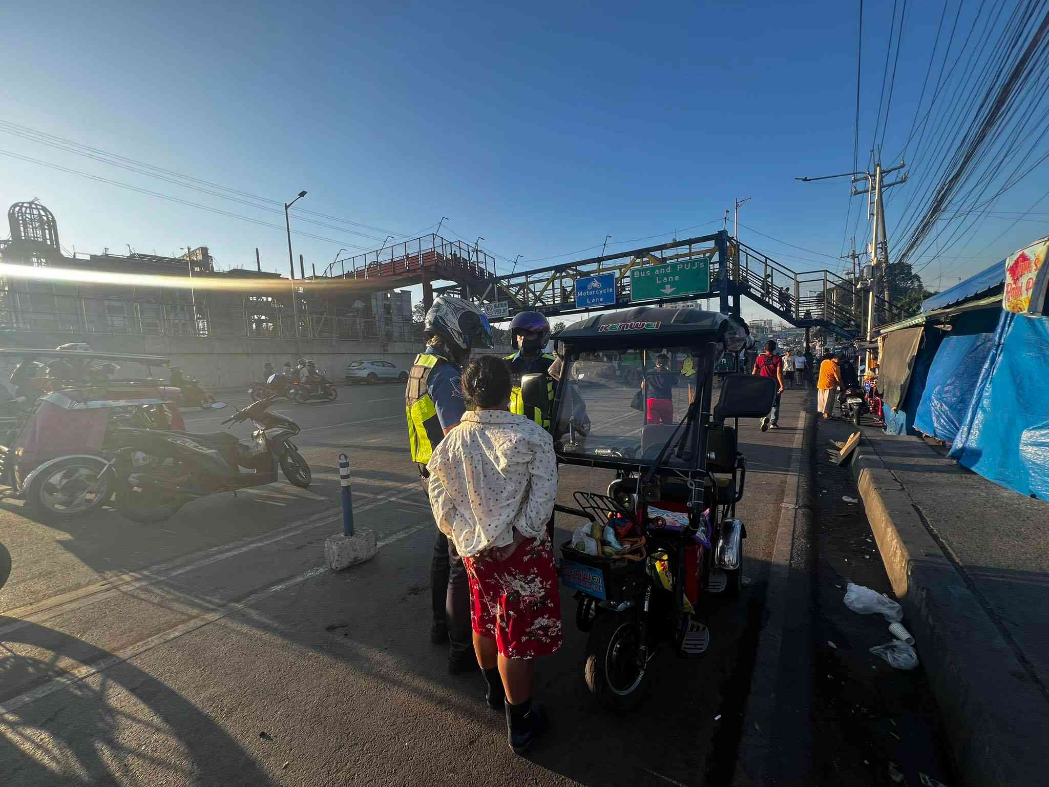 PBBM orders grace period to e-vehicles, tricycles on national roads