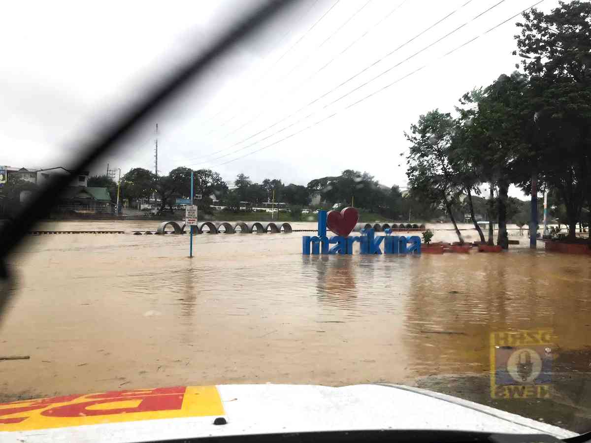 2nd alarm raised over Marikina River as water reaches 16 meters due to Paeng