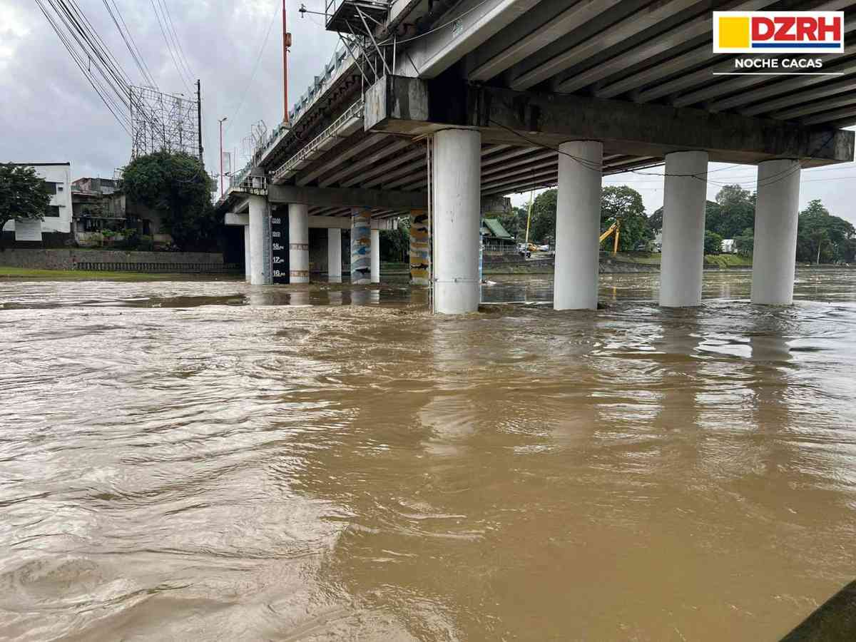 First alarm raised over Marikina river as water reaches 15 meters