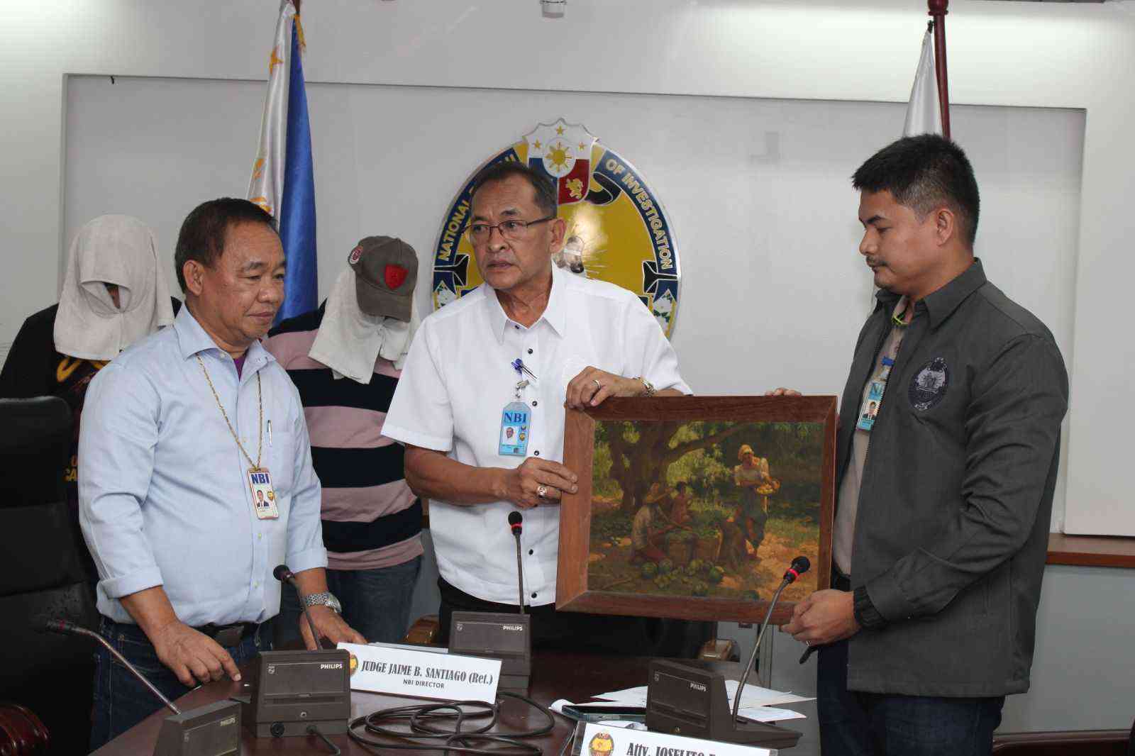 NBI recovers stolen Amorsolo painting, 2 suspects arrested