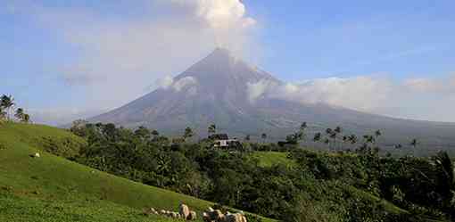 Philippines raises alert level at rumbling volcano after rockfall, quakes