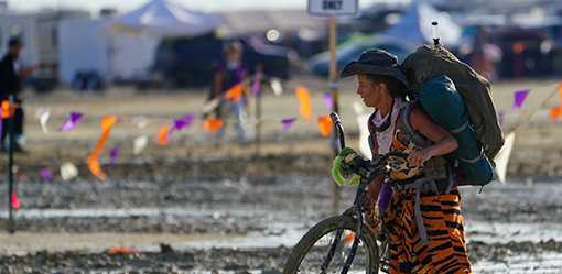 Burning Man revelers unfazed by deluge and deep mud