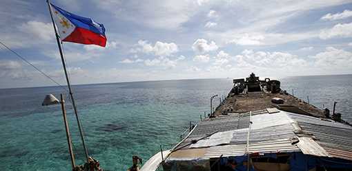 China condemns Philippine re-supply mission to disputed atoll