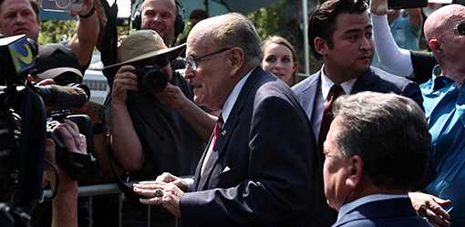 Giuliani surrenders in Trump election subversion case, $150,000 bond set