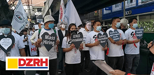 Health workers rally in front of DOH on Valentine's Day