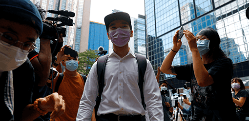 Hong Kong protester shot by police sentenced to nearly four years jail