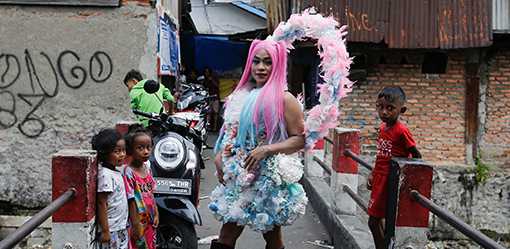Indonesian transgender models shine spotlight on pollution with plastic fashion