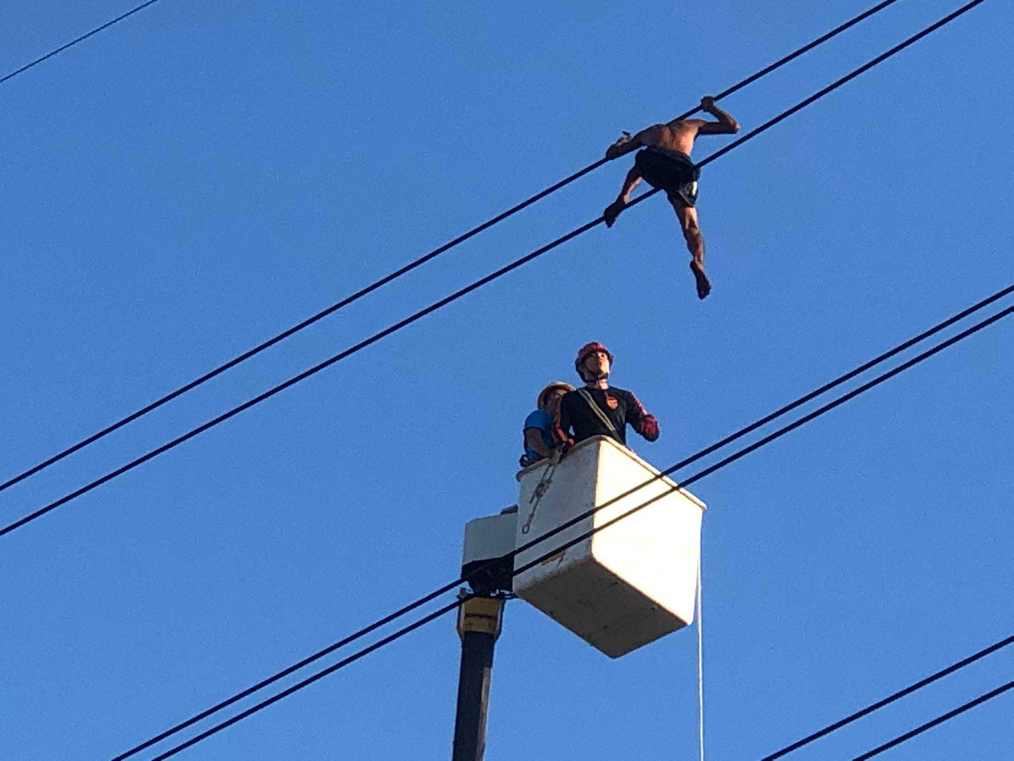 Marikina City Rescue saves man who climbed high electric post in Marikina after almost 30 hours