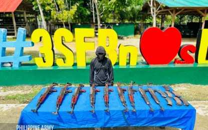 NPA leader hands over 9 firearms in Surigao Sur