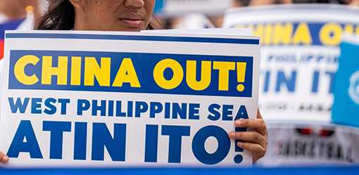 Philippines rejects 'use of force' to undermine its South China Sea interests