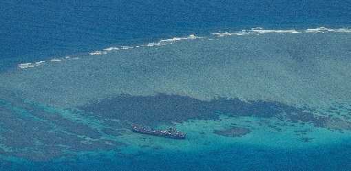 Philippines says China's South China Sea moves aggressive, illegal