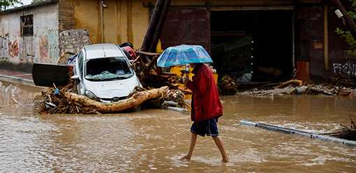 Torrential rain follows summer wildfires in Greece, one dead