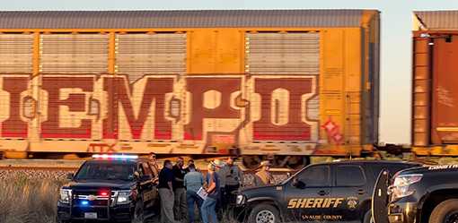 Two migrants suffocate to death aboard Texas train, 10 hospitalized