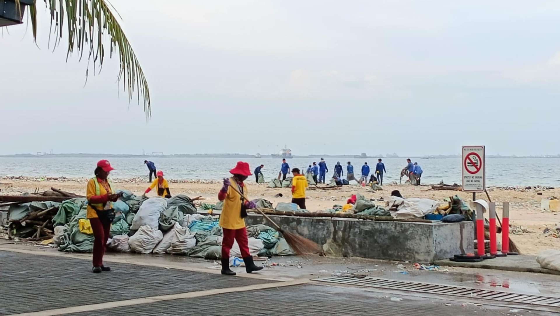MMDA, DENR initiate cleanup ops at Manila Baywalk Dolomite Beach after Typhoon Carina, Habagat