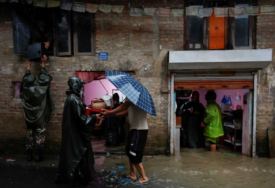 Heavy rains kill at least 22 in Nepal, block roads