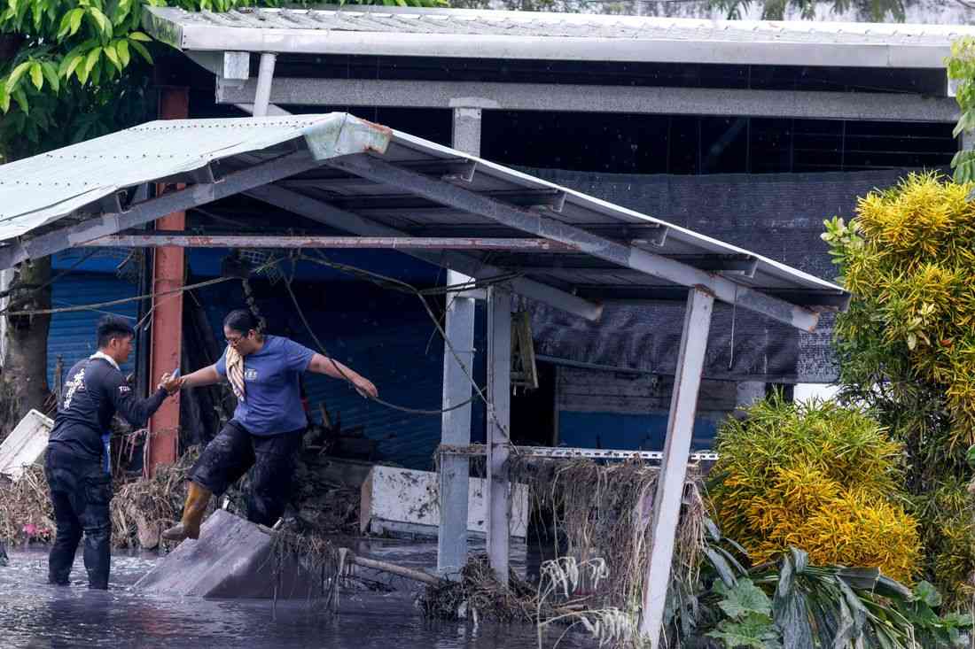 Taiwan rescuers battle thick mud to look for missing from Super Typhoon Ragasa