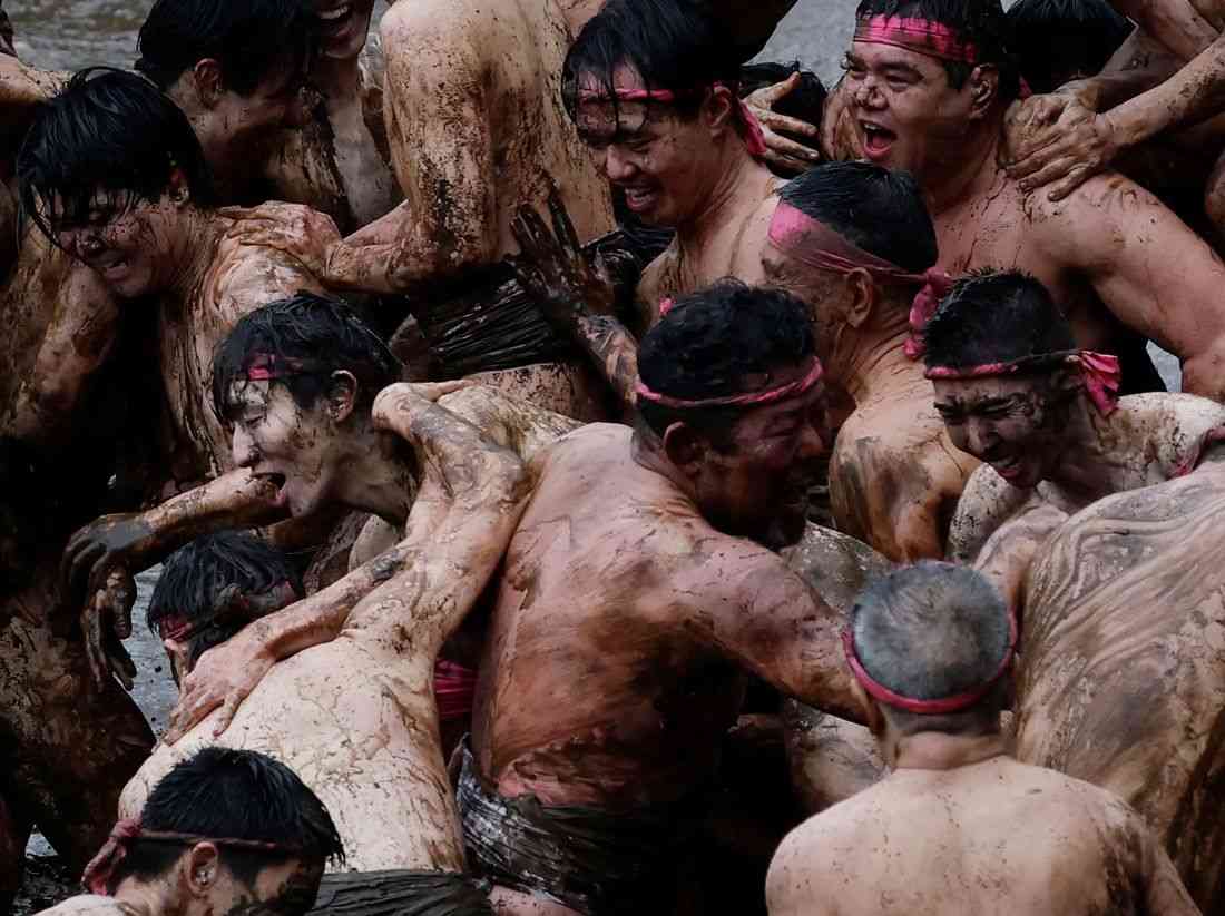'Blessed rain': Japanese men in loincloths wrestle in harvest rite