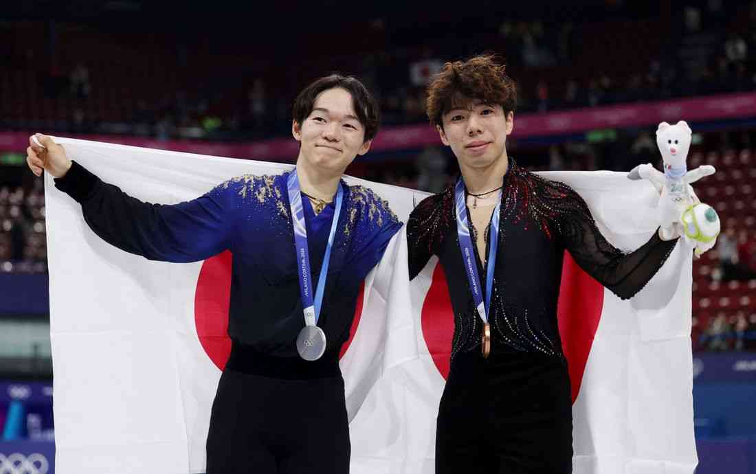 Olympics-Figure Skating-Japan take silver and bronze in bittersweet night for Kagiyama