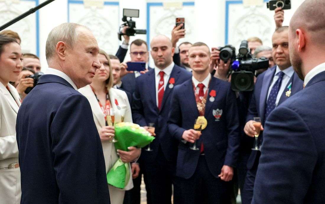 Olympics-Putin criticises previous IOC leadership as 'shameful, cowardly'