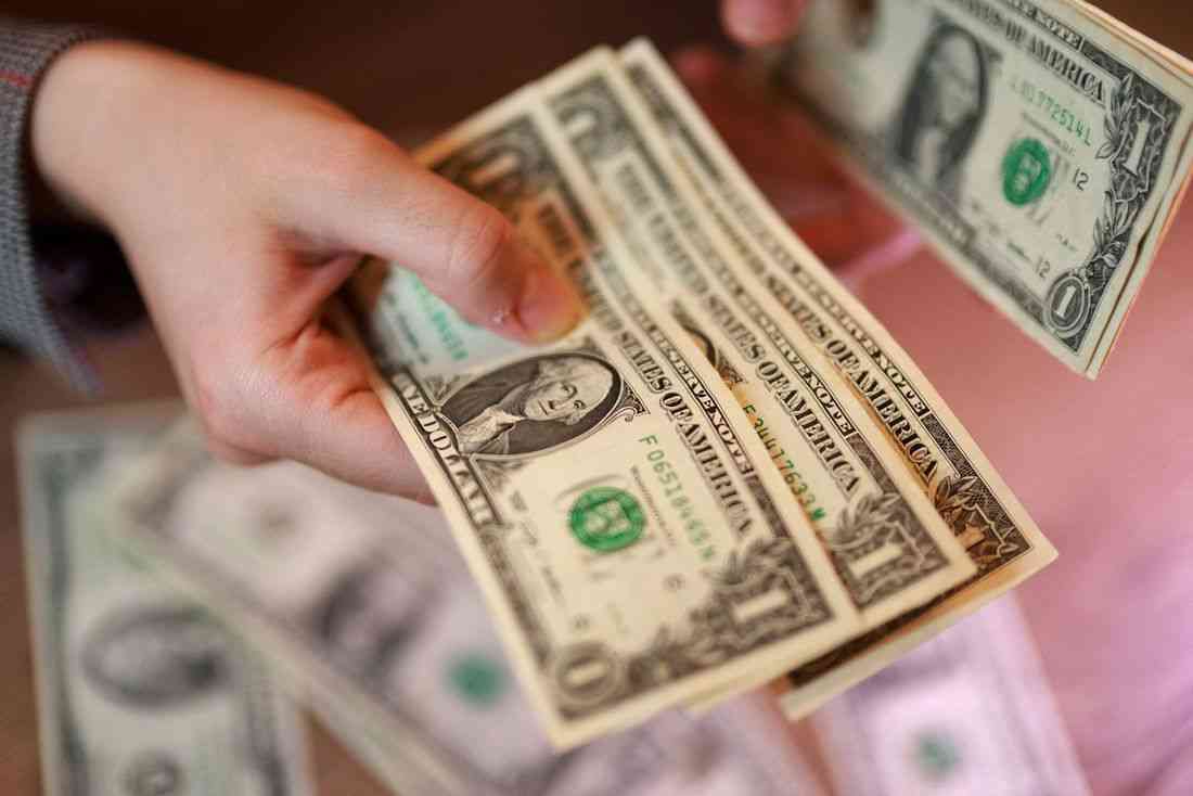 Dollar near one-week high as hot U.S. inflation fans Fed hike bets, peace talks stall