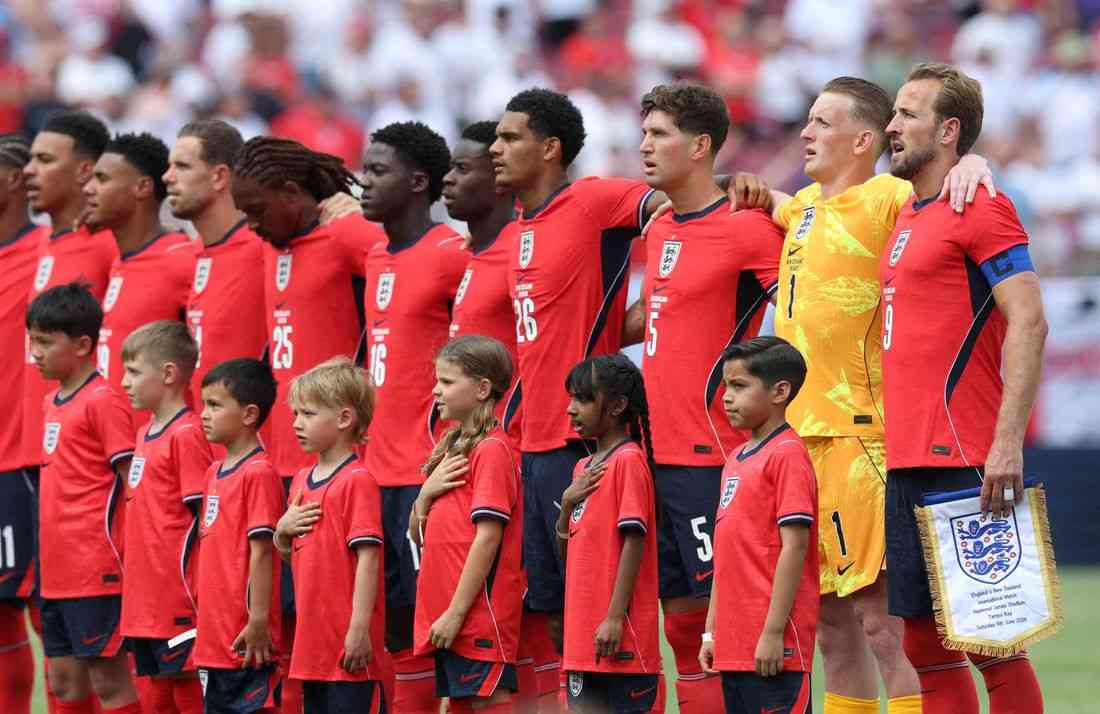 Soccer-England labour to win over New Zealand as Germany defeat USA