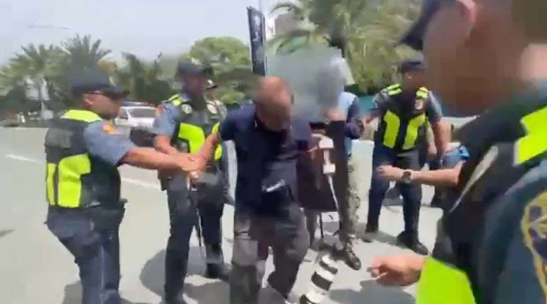 Veteran photojournalist nearly arrested amid police-protester clash at Pasay rally