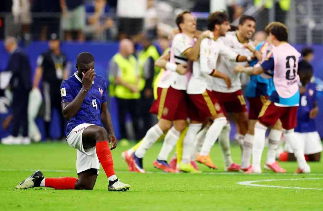 Soccer-France fail World Cup Spanish test in spectacular fashion