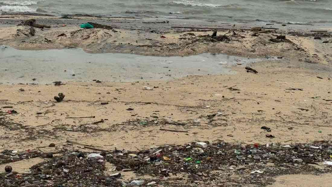 Trash piles up along Manila Bay Dolomite Beach after monsoon rains