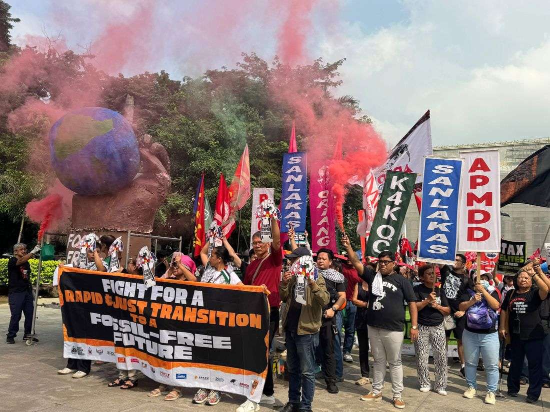 Climate activists rally in Manila, demand action against fossil fuels