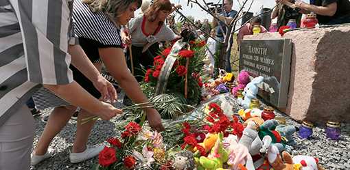 Australia imposes sanctions on three men over downing of Flight MH17