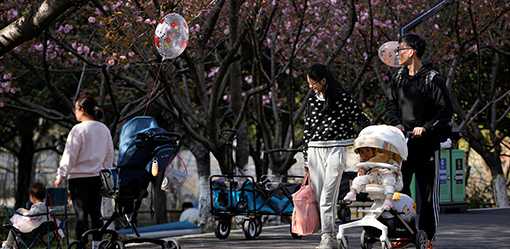 Births in China slide 10% to hit their lowest on record