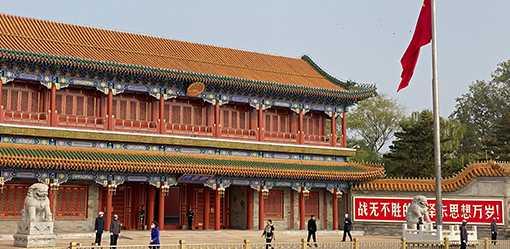 China cremates 'people's' premier, lowers national flag amidst outpouring of grief