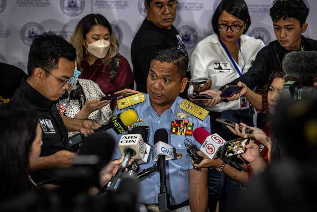 China denies Philippine report of "artificial island" in disputed waters
