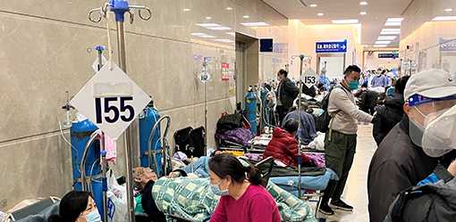 China media plays down COVID severity as WHO seeks detail on variants