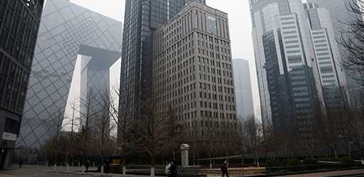 China sets slightly lower annual GDP growth target - government report