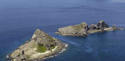 Chinese and Japanese coast guard ships in stand-off around disputed islands