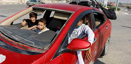 Gaza evacuations suspended after ambulance attacked - Egyptian sources