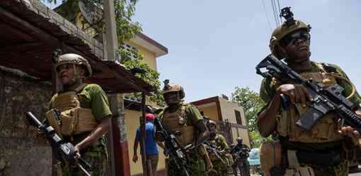 Haiti PM travels to US as Kenyan police patrol capital