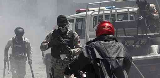 Haitian gang slaughters at least 70 people as thousands flee