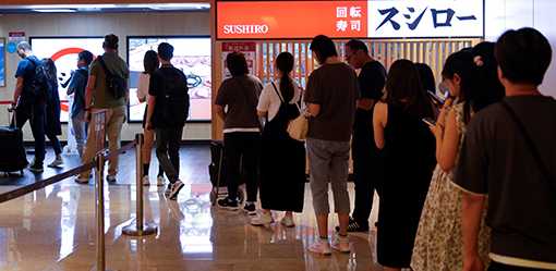 Hong Kong's long sushi queues show few worried at Japan's wastewater release