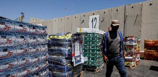 Israel cites aid backlog in Gaza; UN says: 'We're doing what we can'