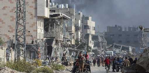 Israel says it is pushing to get aid into Gaza before US deadline as fighting persists