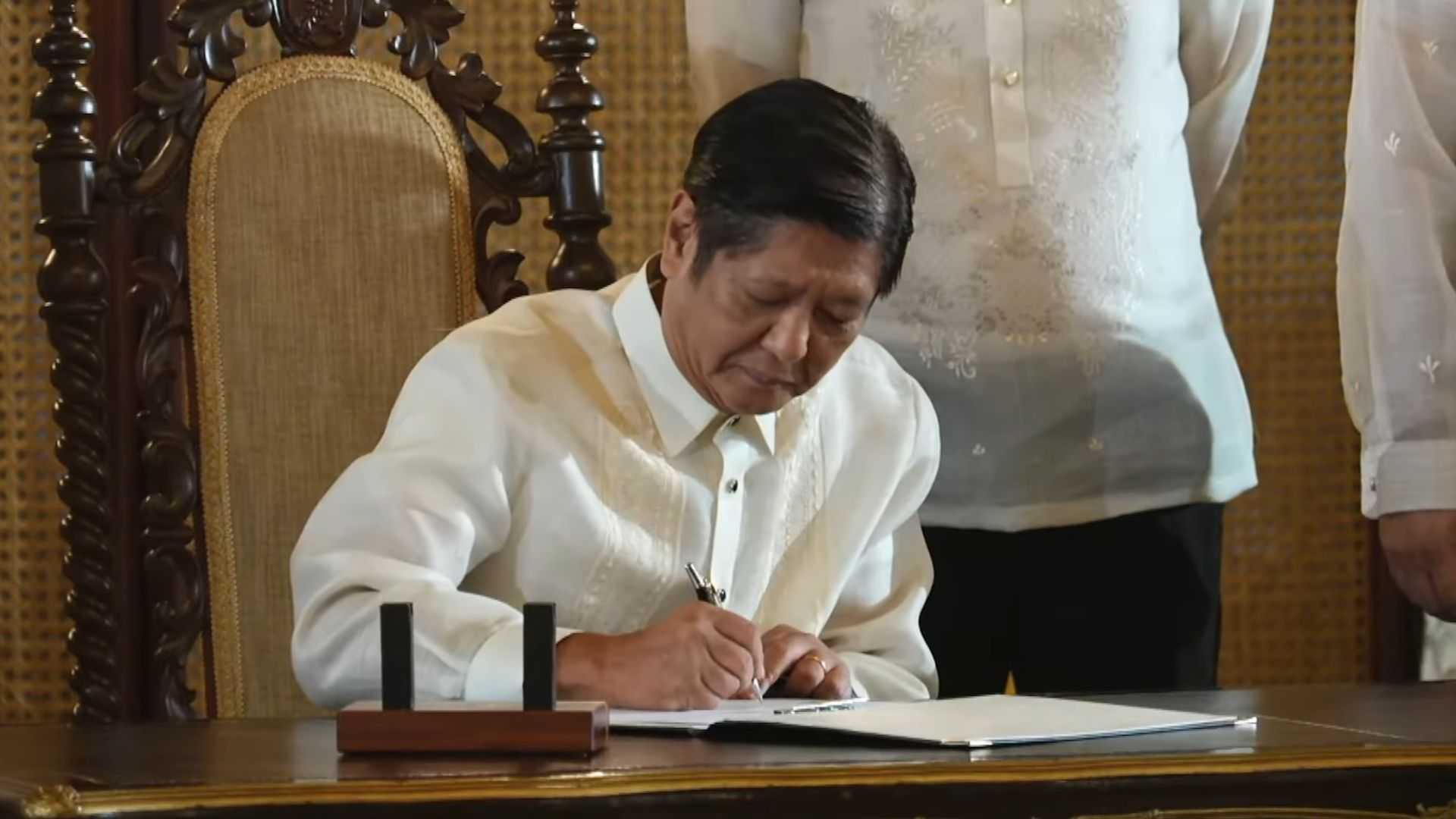 Marcos signs laws establishing evacuation centers, moratorium for student loan payments