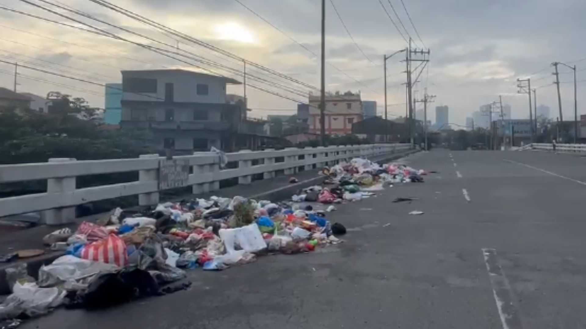 New Year’s Eve celebrations leave firework debris, plastic, food wastes piled up along Manila streets