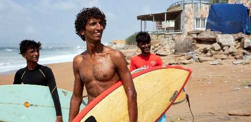 On Pakistan's southern coast, a group of surfers chases waves and their dreams