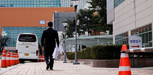 Overworked and unheard, South Korean doctors on mass walkout say