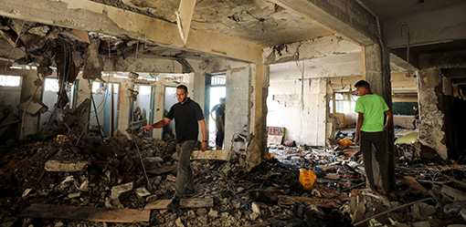 Palestinians say Israeli strike killed 22 in shelter, army says militants hit